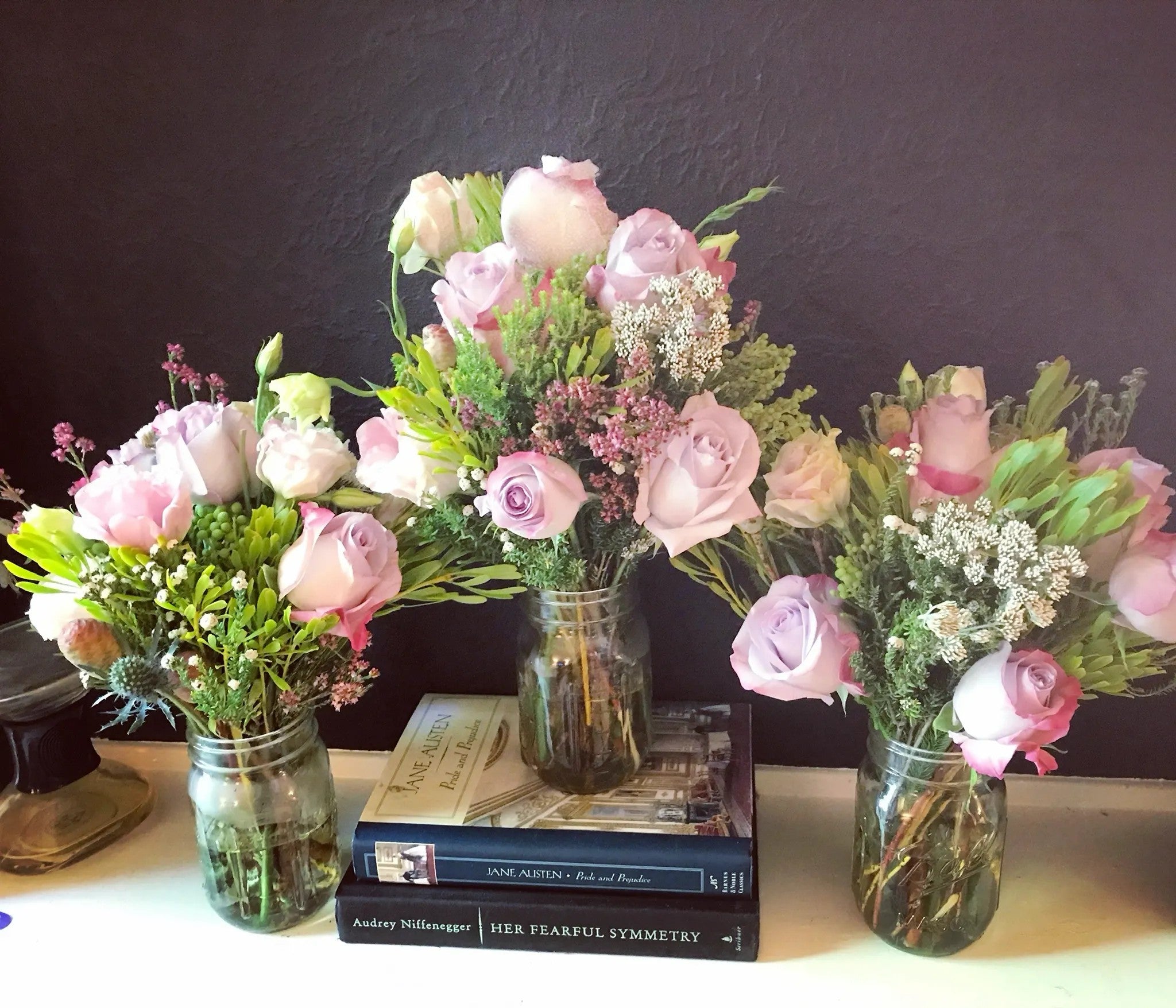 Botanical Textures luxury floral arrangement featuring premium lavender garden roses, spray roses, and textured sea holly thistle by Nifty Package Co.